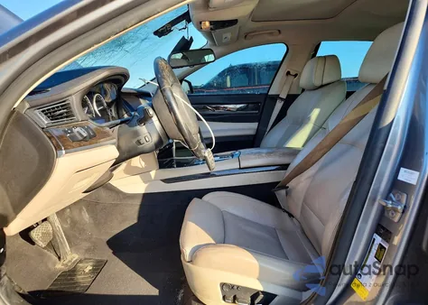 2012 BMW 750 Li z USA, uszkodzony, nr VIN WBAKB8C51CC965264